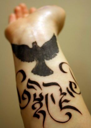 Tribal Dove Tattoo On Wrist